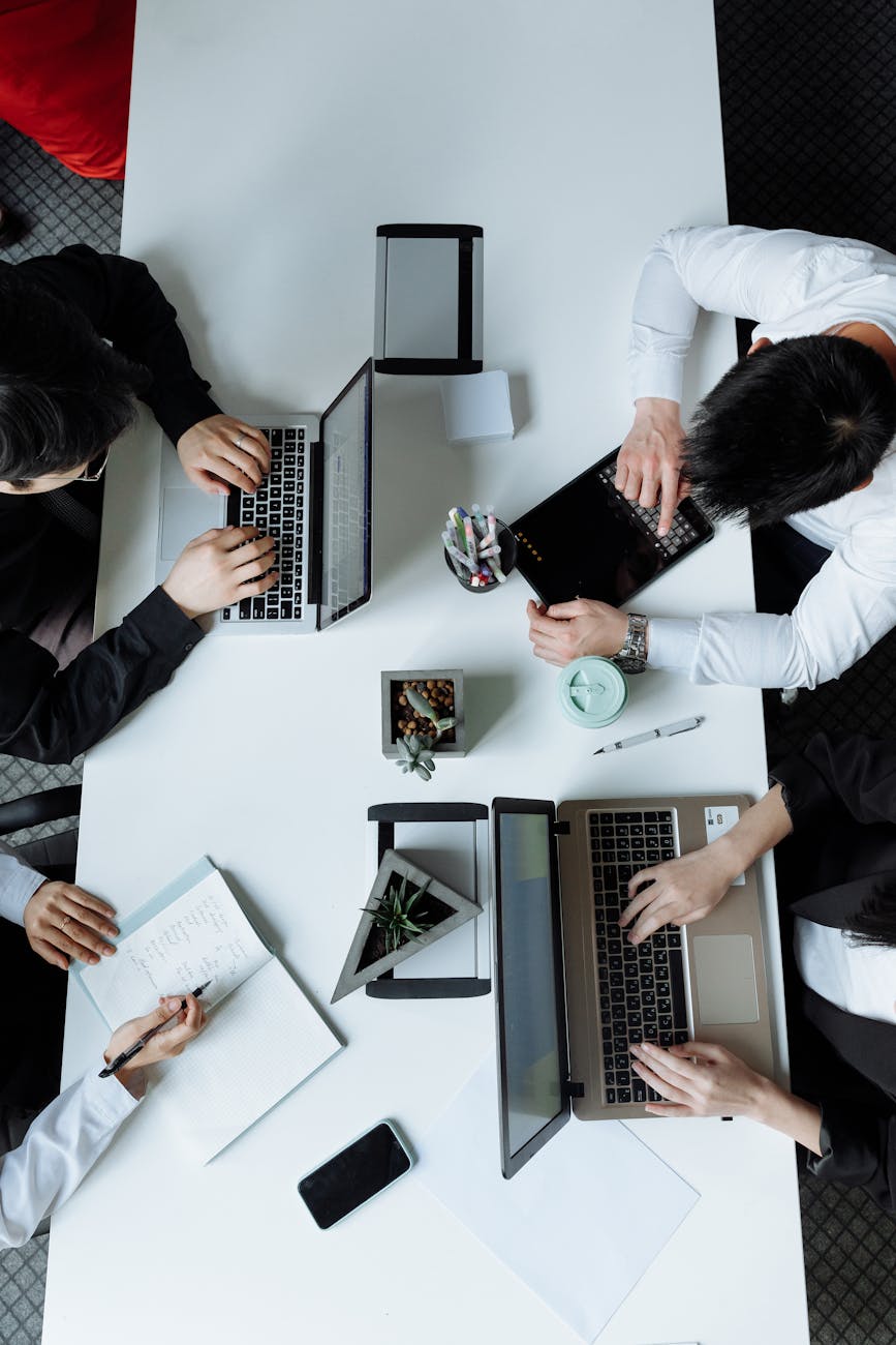 overhead shot of a group of people having a meeting